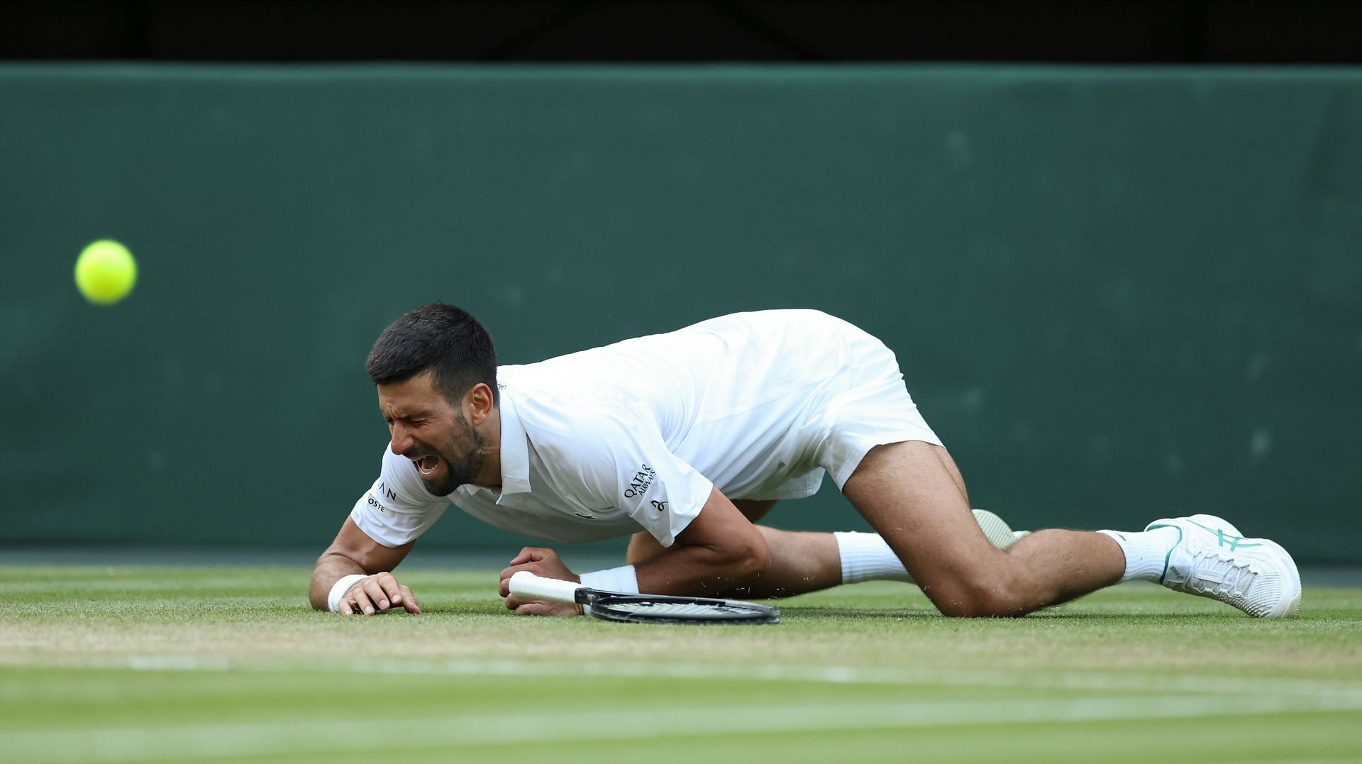 Novak Djokovic after slipping during his 2025 Wimbledon quarterfinal match against Flavio Cobolli (Source: Getty)